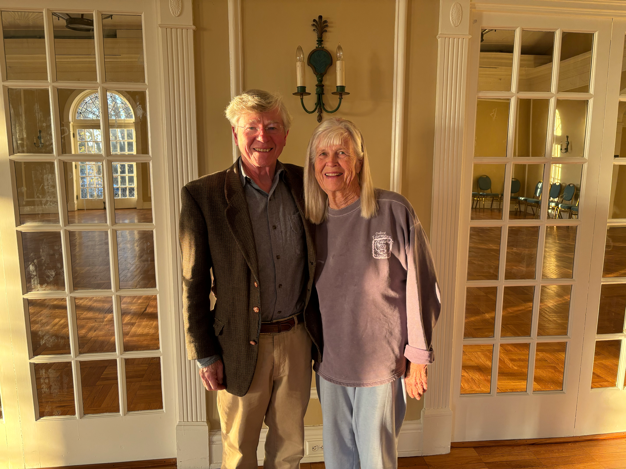 Warren and Judy Waldron stand in the ballroom in the Oxford Community Arts Center