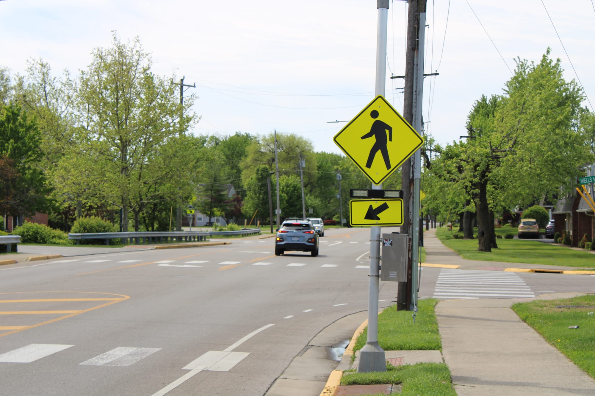 Pedestrian crossing sign on South Locust Street