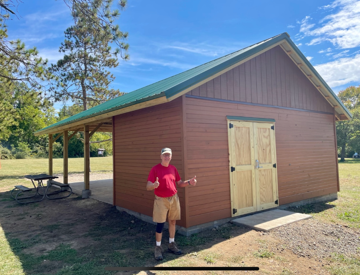 Ron Overly stands in front of the pavilion.