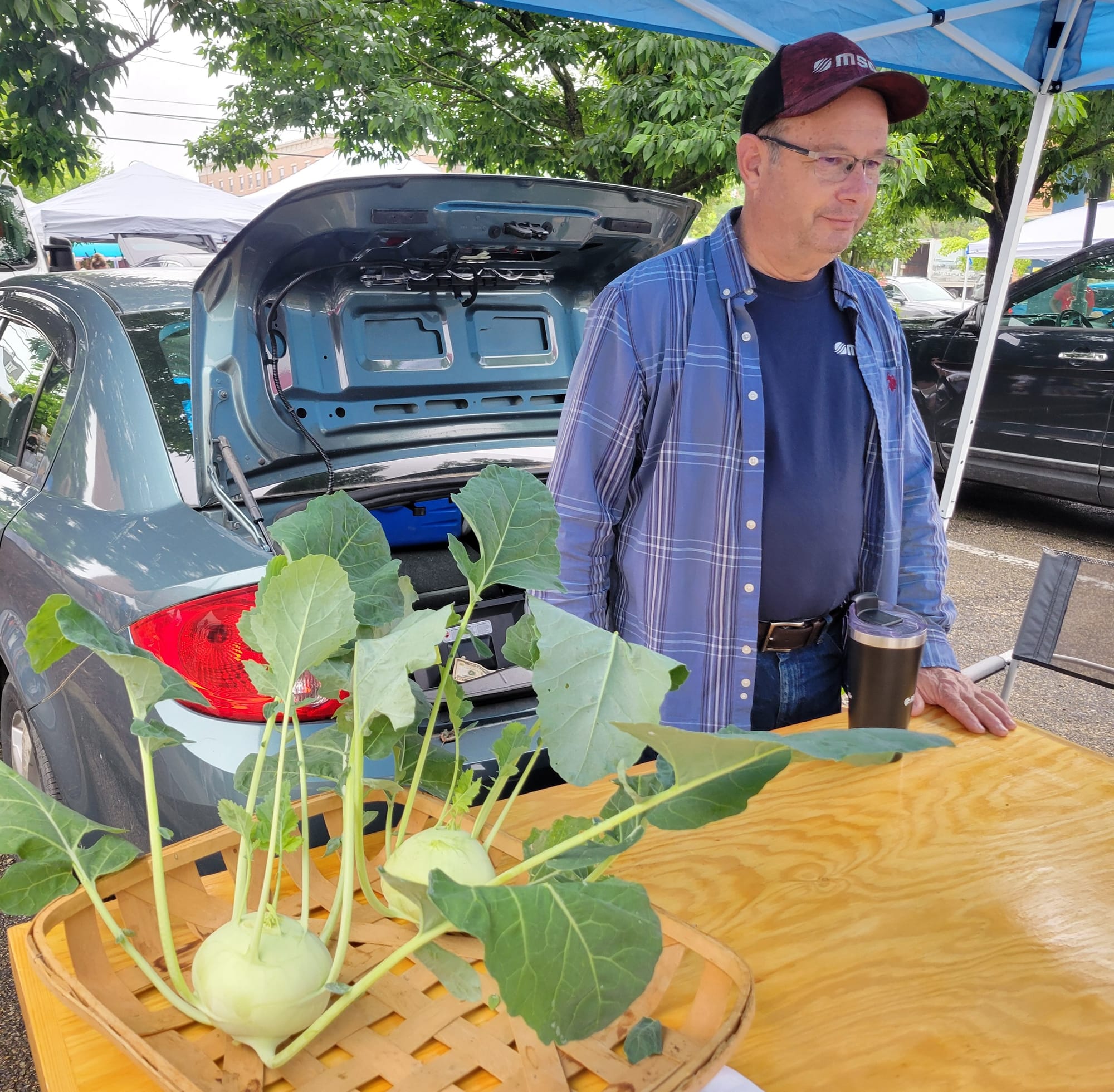 Greg Hamm sells kohlrabi at the Oxford Farmers Market