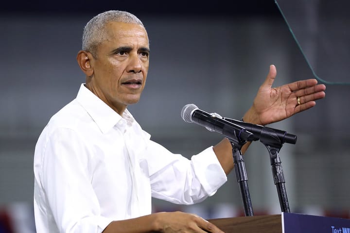 Former President of the United States Barack Obama speaking with supporters at a campaign rally for Vice President Kamala Harris