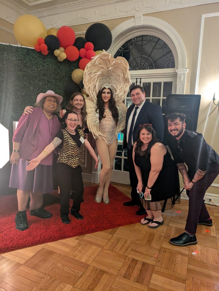 Attendees from the first annual Oxford Pride event gather around drag performer P.H. Dee.