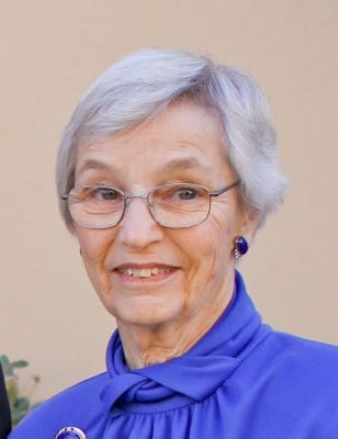 Marcia Jane Pray Thomas, wearing a blue top.